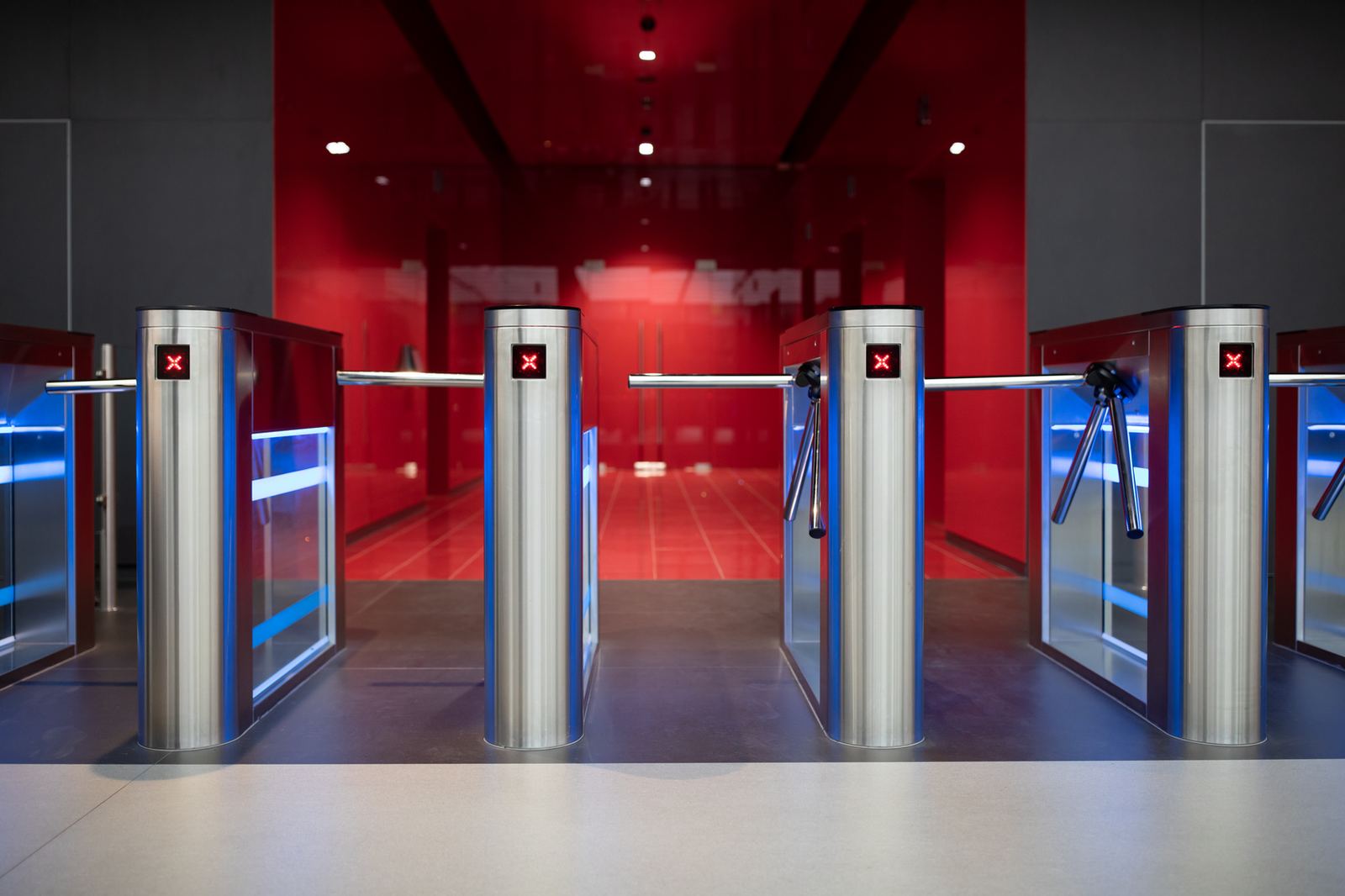 Automatic turnstiles at a controlled entry point